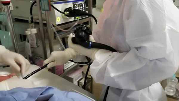 Will it be painful if polyps are found during a colonoscopy?