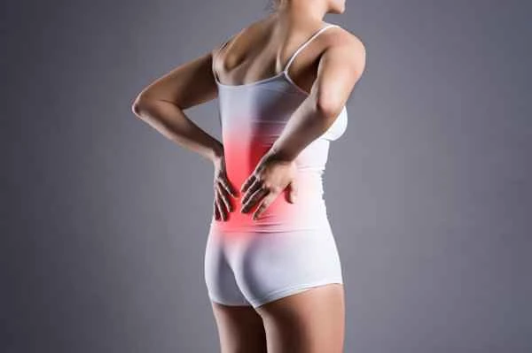 Does having intestinal polyps cause lower back pain?